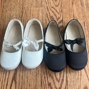 Pair of cream and black dressy shoes
